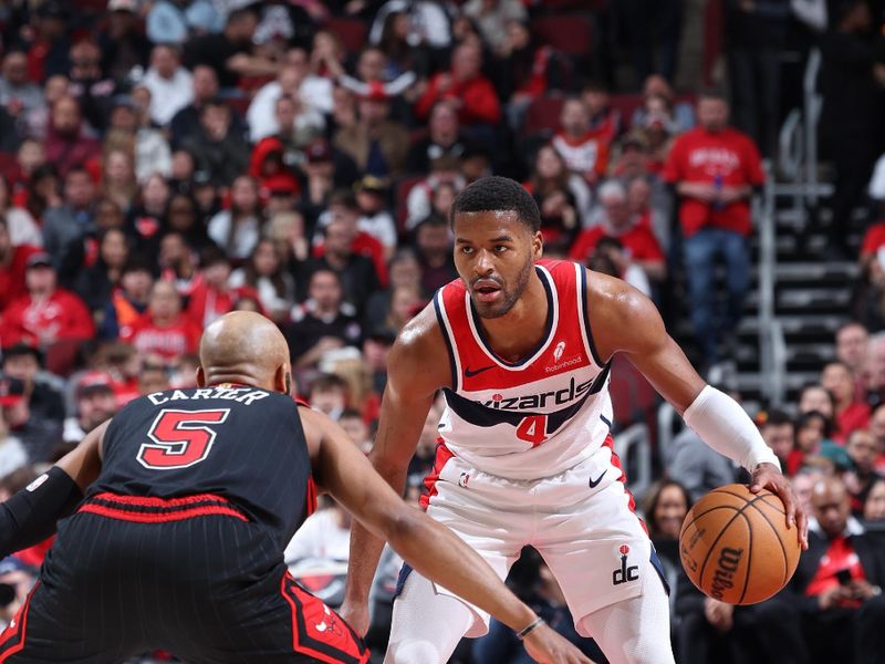 CHICAGO, IL - MARCH 25:  Jared Butler #4 of the Washington Wizards dribbles the ball during the game against the Chicago Bulls on March 25, 2024 at United Center in Chicago, Illinois. NOTE TO USER: User expressly acknowledges and agrees that, by downloading and or using this photograph, User is consenting to the terms and conditions of the Getty Images License Agreement. Mandatory Copyright Notice: Copyright 2024 NBAE (Photo by Jeff Haynes/NBAE via Getty Images)