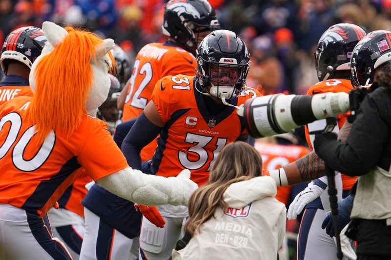 Denver Broncos safety Justin Simmons (31)is introduced against the Kansas City Chiefs of an NFL football game Sunday October 29, 2023, in Denver. (AP Photo/Bart Young)