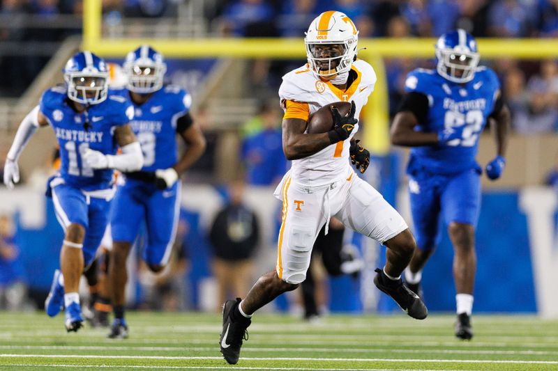 Oct 28, 2023; Lexington, Kentucky, USA; Tennessee Volunteers quarterback Joe Milton III (7) runs the ball during the third quarter against the Kentucky Wildcats at Kroger Field. Mandatory Credit: Jordan Prather-USA TODAY Sports