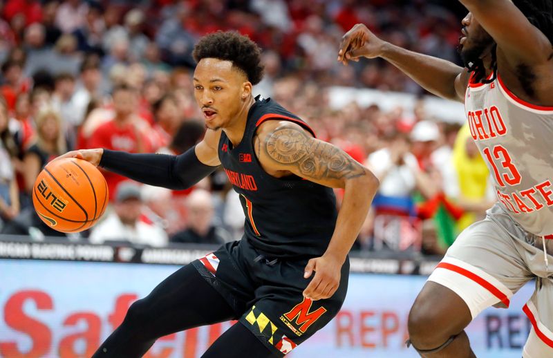 Mar 1, 2023; Columbus, Ohio, USA;  Maryland Terrapins guard Jahmir Young (1) looks to score as Ohio State Buckeyes guard Isaac Likekele (13) defends during the first half at Value City Arena. Mandatory Credit: Joseph Maiorana-USA TODAY Sports