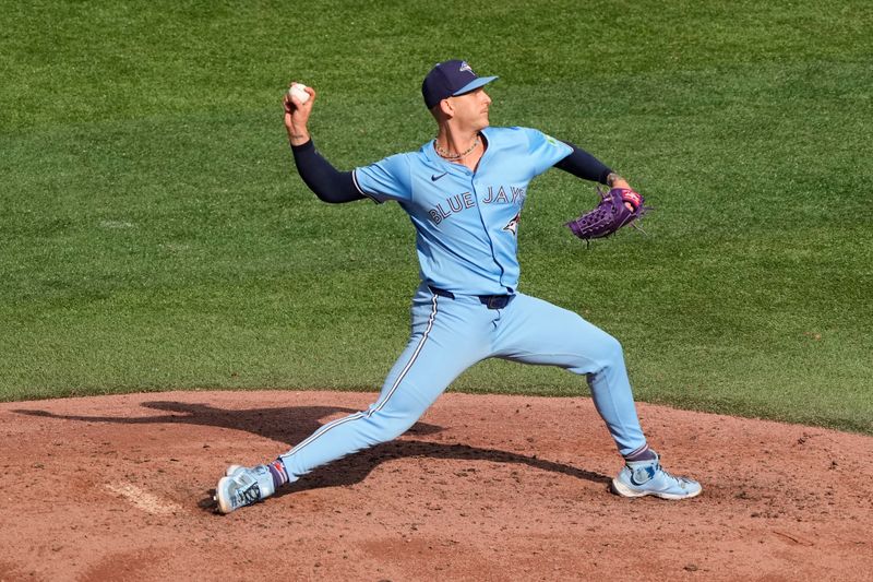 Aug 24, 2024; Toronto, Ontario, CAN; Toronto Blue Jays starting pitcher Bowden Francis (44) pitches to the Los Angeles Angels during the eighth inning at Rogers Centre. Mandatory Credit: John E. Sokolowski-USA TODAY Sports