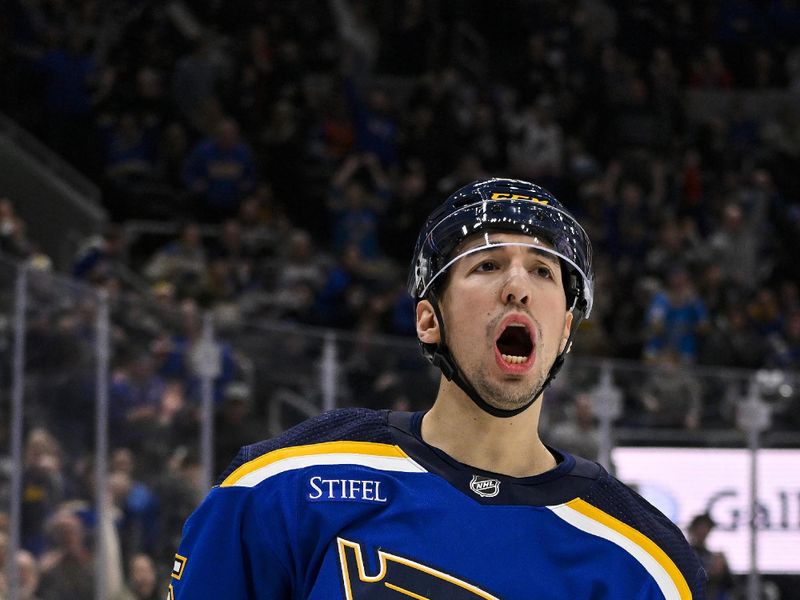 Feb 15, 2024; St. Louis, Missouri, USA;  St. Louis Blues center Jordan Kyrou (25) reacts after scoring against Edmonton Oilers goaltender Stuart Skinner (not pictured) during the second period at Enterprise Center. Mandatory Credit: Jeff Curry-USA TODAY Sports