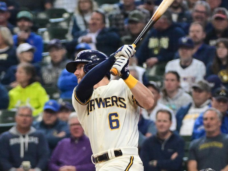 May 24, 2023; Milwaukee, Wisconsin, USA; Milwaukee Brewers third baseman Owen Miller (6) hits a solo home run against the Houston Astros in the seventh inning at American Family Field. Mandatory Credit: Benny Sieu-USA TODAY Sports