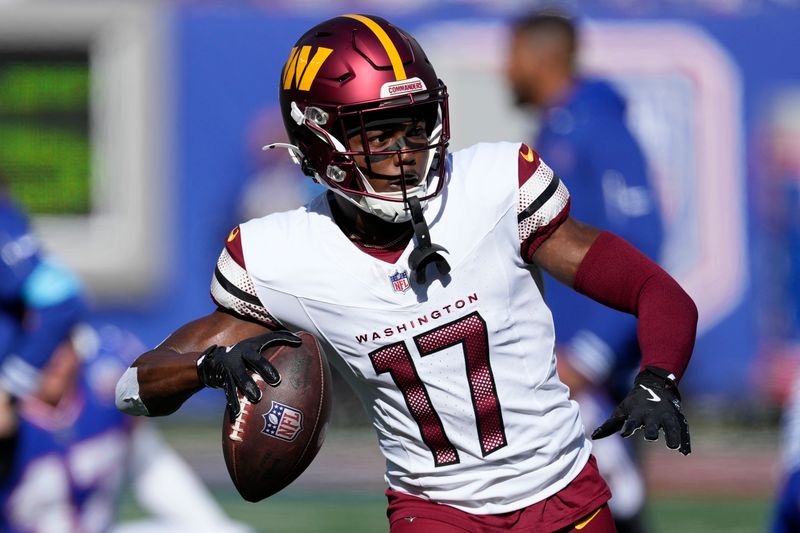 Washington Commanders wide receiver Terry McLaurin (17) warms up before playing against the New York Giants in an NFL football game, Sunday, Nov. 3, 2024, in East Rutherford, N.J. (AP Photo/Seth Wenig)