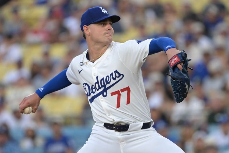 Jul 22, 2024; Los Angeles, California, USA;  Los Angeles Dodgers starting pitcher Ryan River (77) delivers to the plate in the first inning against the San Francisco Giants at Dodger Stadium. Mandatory Credit: Jayne Kamin-Oncea-USA TODAY Sports