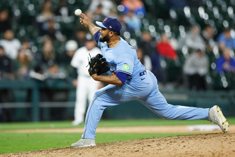 May 27, 2024; Chicago, Illinois, USA; Toronto Blue Jays relief pitcher Yimi García (93) delivers a pitch against the Chicago White Sox during the eight inning at Guaranteed Rate Field. Mandatory Credit: Kamil Krzaczynski-USA TODAY Sports