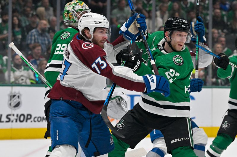 May 15, 2024; Dallas, Texas, USA; Colorado Avalanche center Yakov Trenin (73) and Dallas Stars defenseman Esa Lindell (23) battle for position in the Dallas crease during the first period in game five of the second round of the 2024 Stanley Cup Playoffs at American Airlines Center. Mandatory Credit: Jerome Miron-USA TODAY Sports