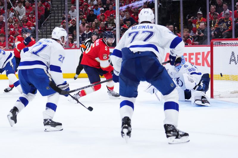 Tampa Bay Lightning's Erik Cernak Strikes Amidst Florida Panthers' Late Surge at Amerant Bank Ar...