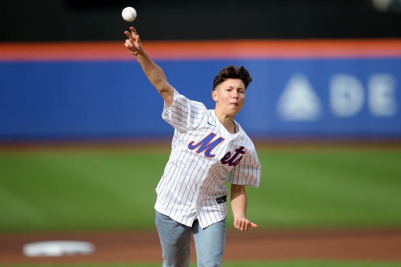 Sep 30, 2023; New York City, New York, USA; English cricketer Issy Wong throws out a ceremonial first pitch before a game between the New York Mets and the Philadelphia Phillies at Citi Field. Mandatory Credit: Brad Penner-USA TODAY Sports