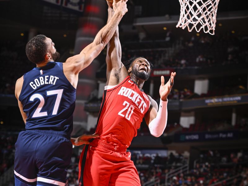 HOUSTON, TX - JANUARY 23:   Bruno Fernando #20 of the Houston Rockets drives to the basket during the game against the  Minnesota Timberwolves on January 23, 2023 at the Toyota Center in Houston, Texas. NOTE TO USER: User expressly acknowledges and agrees that, by downloading and or using this photograph, User is consenting to the terms and conditions of the Getty Images License Agreement. Mandatory Copyright Notice: Copyright 2023 NBAE (Photo by Logan Riely/NBAE via Getty Images)