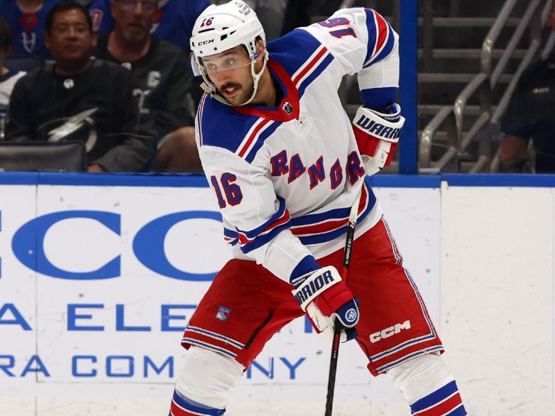 Mar 14, 2024; Tampa, Florida, USA; New York Rangers center Vincent Trocheck (16) skates with the puck against the Tampa Bay Lightning  during the second period at Amalie Arena. Mandatory Credit: Kim Klement Neitzel-USA TODAY Sports