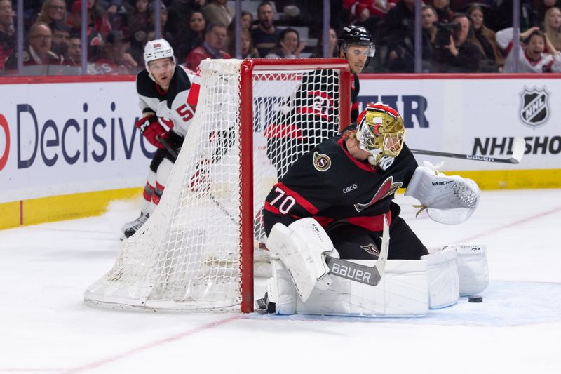 Apr 6, 2024; Ottawa, Ontario, CAN; Ottawa Senators goalie Joonas Korpisalo (70) makes a save on a shot from New Jersey Devils left wing Erik Haula (56) in the second period at the Canadian Tire Centre. Mandatory Credit: Marc DesRosiers-USA TODAY Sports