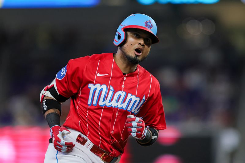 Sep 16, 2023; Miami, Florida, USA; Miami Marlins second baseman Luis Arraez (3) circles the bases after hitting a home run against the Atlanta Braves during the first inning at loanDepot Park. Mandatory Credit: Sam Navarro-USA TODAY Sports