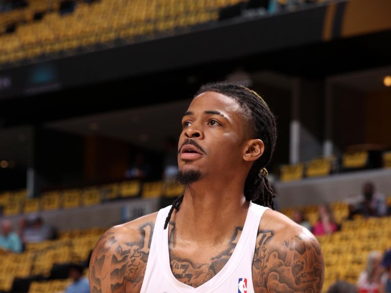 MEMPHIS, TN - APRIL 24: Ja Morant #12 of the Memphis Grizzlies warms up before the game against the Oklahoma City Thunder during Round One Game Three of the 2025 NBA Playoffs on April 24, 2025 at FedExForum in Memphis, Tennessee. NOTE TO USER: User expressly acknowledges and agrees that, by downloading and or using this photograph, User is consenting to the terms and conditions of the Getty Images License Agreement. Mandatory Copyright Notice: Copyright 2025 NBAE (Photo by Joe Murphy/NBAE via Getty Images)