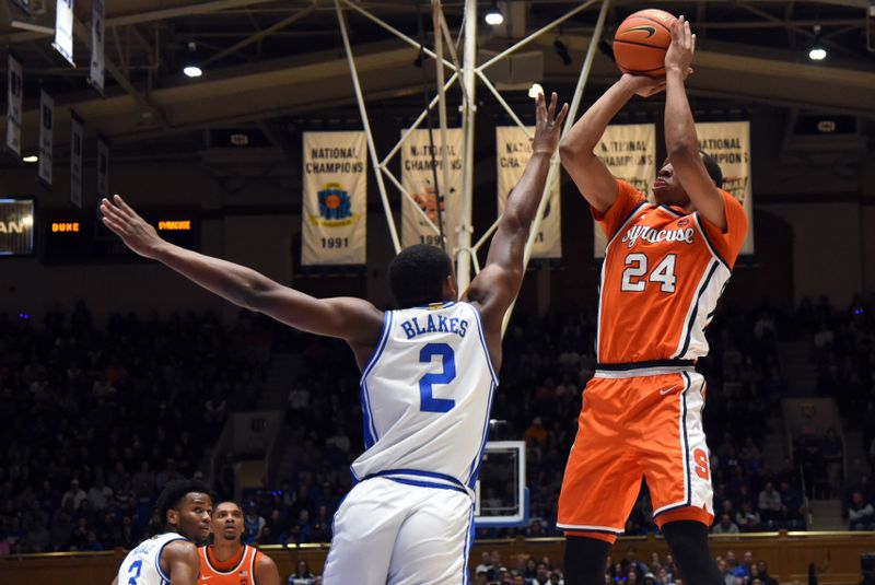 Jan 2, 2024; Durham, North Carolina, USA;  Syracuse Orange guard Quadir Copeland (24) shoots over Duke Blue Devils guard Jaylen Blakes (2) during the first half at Cameron Indoor Stadium. Mandatory Credit: Rob Kinnan-USA TODAY Sports