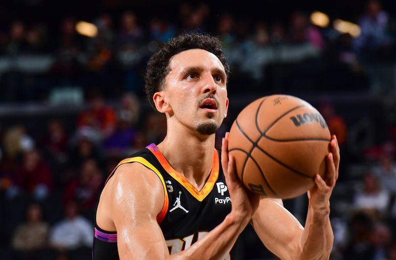 PHOENIX, AZ - JANUARY 6: Landry Shamet #14 of the Phoenix Suns shoots free throw during the game against the Miami Heat on January 6, 2023 at Footprint Center in Phoenix, Arizona. NOTE TO USER: User expressly acknowledges and agrees that, by downloading and or using this photograph, user is consenting to the terms and conditions of the Getty Images License Agreement. Mandatory Copyright Notice: Copyright 2023 NBAE (Photo by Kate Frese/NBAE via Getty Images)