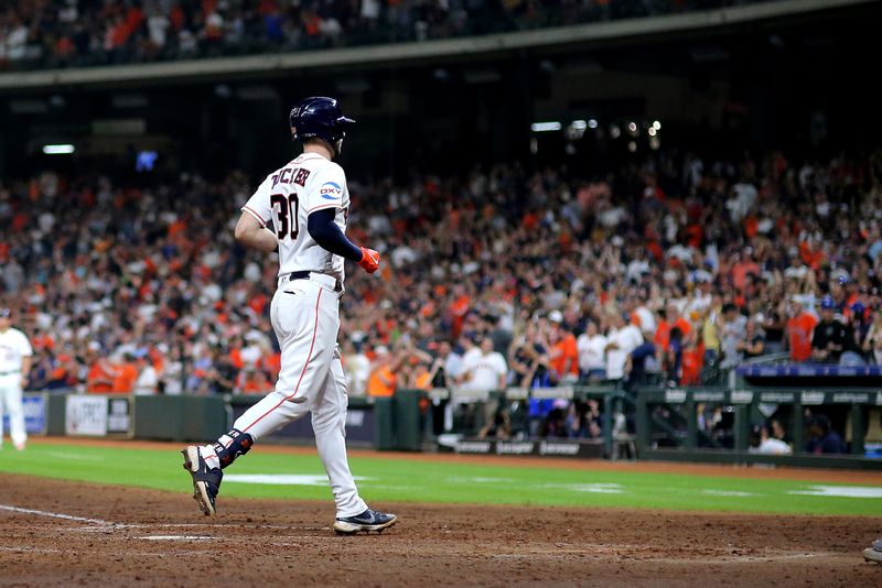 Sep 13, 2023; Houston, Texas, USA; Houston Astros right fielder Kyle Tucker (30) crosses home plate after hitting a home run to right field against the Oakland Athletics during the seventh inning at Minute Maid Park. Mandatory Credit: Erik Williams-USA TODAY Sports