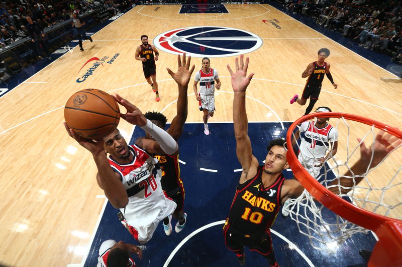 WASHINGTON, DC -? OCTOBER 30: Alexandre Sarr #20 of the Washington Wizards drives to the basket during the game against the Atlanta Hawks during a regular season game on October 30, 2024 at Capital One Arena in Washington, DC. NOTE TO USER: User expressly acknowledges and agrees that, by downloading and or using this Photograph, user is consenting to the terms and conditions of the Getty Images License Agreement. Mandatory Copyright Notice: Copyright 2024 NBAE (Photo by Kenny Giarla/NBAE via Getty Images)