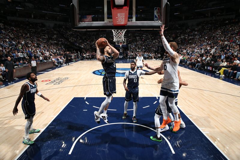 MINNEAPOLIS, MN -  OCTOBER 29: Dereck Lively II #2 of the Dallas Mavericks goes up for the rebound during the game against the Minnesota Timberwolves on October 29, 2024 at Target Center in Minneapolis, Minnesota. NOTE TO USER: User expressly acknowledges and agrees that, by downloading and or using this Photograph, user is consenting to the terms and conditions of the Getty Images License Agreement. Mandatory Copyright Notice: Copyright 2024 NBAE (Photo by David Sherman/NBAE via Getty Images)