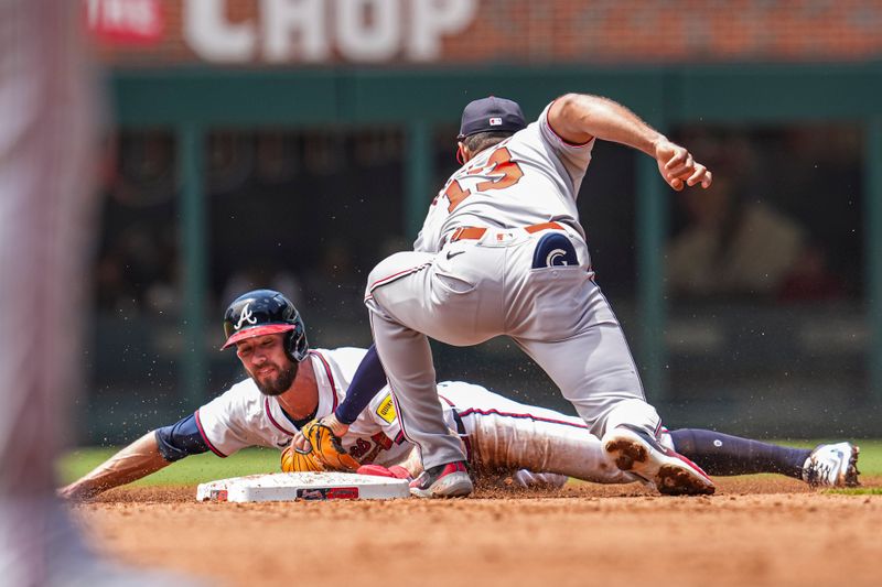 May 15, 2025; Cumberland, Georgia, USA; Atlanta Braves outfielder Eli White (36) steals second base under a tag by Washington Nationals second baseman Amed Rosario (13) during the third inning at Truist Park. Mandatory Credit: Dale Zanine-Imagn Images