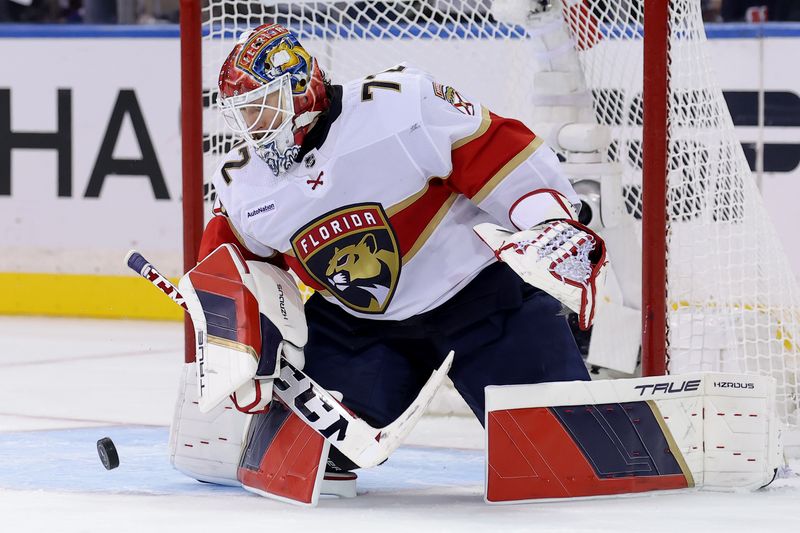 May 22, 2024; New York, New York, USA; Florida Panthers goaltender Sergei Bobrovsky (72) plays the puck against the New York Rangers during the third period of game one of the Eastern Conference Final of the 2024 Stanley Cup Playoffs at Madison Square Garden. Mandatory Credit: Brad Penner-USA TODAY Sports