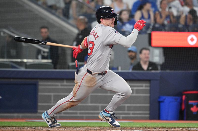 Jun 17, 2024; Toronto, Ontario, CAN;  Boston Red Sox shortstop Romy Gonzalez (23) hits a single against the Toronto Blue Jays in the eighth inning at Rogers Centre. Mandatory Credit: Dan Hamilton-USA TODAY Sports