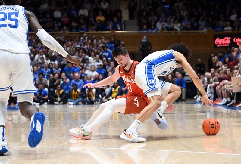 Feb 25, 2023; Durham, North Carolina, USA;  Duke Blue Devils guard Tyrese Proctor (5) steals the ball from Virginia Tech Hokies guard Hunter Cattoor (0) during the first half at Cameron Indoor Stadium. Mandatory Credit: Rob Kinnan-USA TODAY Sports