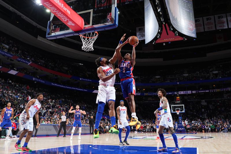 PHILADELPHIA, PA - JANUARY 29: De'Aaron Fox #5 of the Sacramento Kings drives to the basket during the game against the Philadelphia 76ers on January 29, 2025 at the Wells Fargo Center in Philadelphia, Pennsylvania NOTE TO USER: User expressly acknowledges and agrees that, by downloading and/or using this Photograph, user is consenting to the terms and conditions of the Getty Images License Agreement. Mandatory Copyright Notice: Copyright 2025 NBAE (Photo by Jesse D. Garrabrant/NBAE via Getty Images)