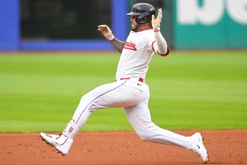 Jun 10, 2025; Cleveland, Ohio, USA; Cleveland Guardians shortstop Gabriel Arias (13) runs to second base in the second inning against the Cincinnati Reds at Progressive Field. Mandatory Credit: David Richard-Imagn Images