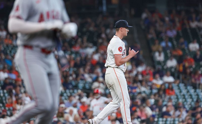 May 22, 2024; Houston, Texas, USA; Houston Astros starting pitcher Hunter Brown (58) reacts after issuing a walk during the third inning against the Los Angeles Angels at Minute Maid Park. Mandatory Credit: Troy Taormina-USA TODAY Sports