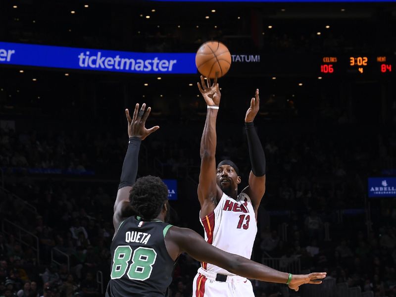 BOSTON, MA - DECEMBER 2: Bam Adebayo #13 of the Miami Heat shoots a three point basket during the game against the Boston Celtics on December 2, 2024 at TD Garden in Boston, Massachusetts. NOTE TO USER: User expressly acknowledges and agrees that, by downloading and/or using this Photograph, user is consenting to the terms and conditions of the Getty Images License Agreement. Mandatory Copyright Notice: Copyright 2024 NBAE (Photo by Brian Babineau/NBAE via Getty Images)