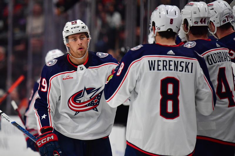 Feb 21, 2024; Anaheim, California, USA; Columbus Blue Jackets right wing Yegor Chinakhov (59) celebrates his goal scored against the Anaheim Ducks during the third period at Honda Center. Mandatory Credit: Gary A. Vasquez-USA TODAY Sports