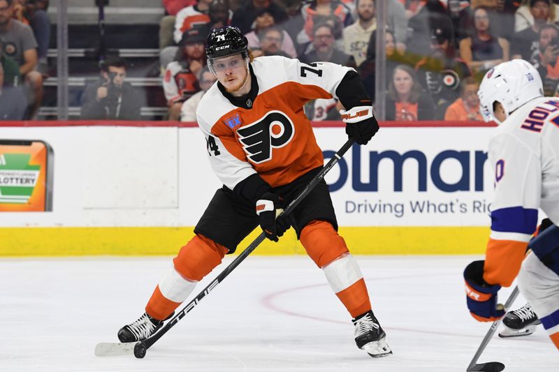 Sep 26, 2024; Philadelphia, Pennsylvania, USA; Philadelphia Flyers right wing Owen Tippett (74) against the New York Islanders during the second period at Wells Fargo Center. Mandatory Credit: Eric Hartline-Imagn Images