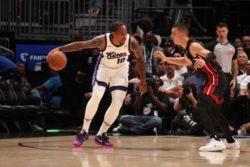 MIAMI, FL - NOVEMBER 4: DeMar DeRozan #10 of the Sacramento Kings dribbles the ball during the game against the Miami Heat   during a regular season game on November 4, 2024 at Kaseya Center in Miami, Florida. NOTE TO USER: User expressly acknowledges and agrees that, by downloading and or using this Photograph, user is consenting to the terms and conditions of the Getty Images License Agreement. Mandatory Copyright Notice: Copyright 2024 NBAE (Photo by Issac Baldizon/NBAE via Getty Images)