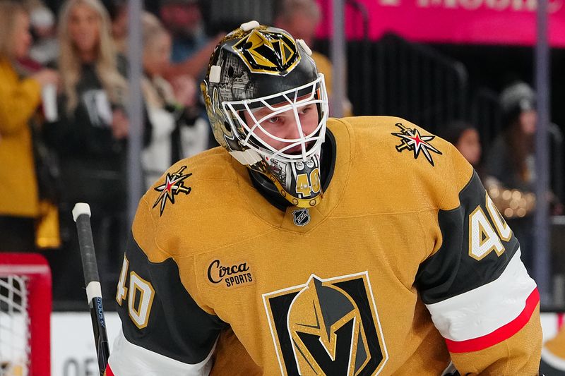 Nov 2, 2024; Las Vegas, Nevada, USA; Vegas Golden Knights goaltender Akira Schmid (40) warms up before a game against the Utah Hockey Club at T-Mobile Arena. Mandatory Credit: Stephen R. Sylvanie-Imagn Images