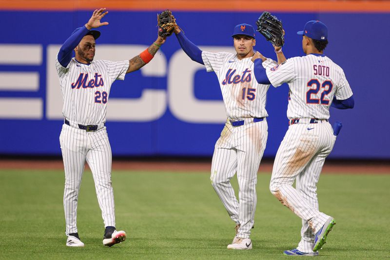 Apr 29, 2025; New York City, New York, USA; New York Mets left fielder Jose Azocar (28) and center fielder Tyrone Taylor (15) and right fielder Juan Soto (22) celebrate after defeating the Arizona Diamondbacks at Citi Field. Mandatory Credit: Vincent Carchietta-Imagn Images