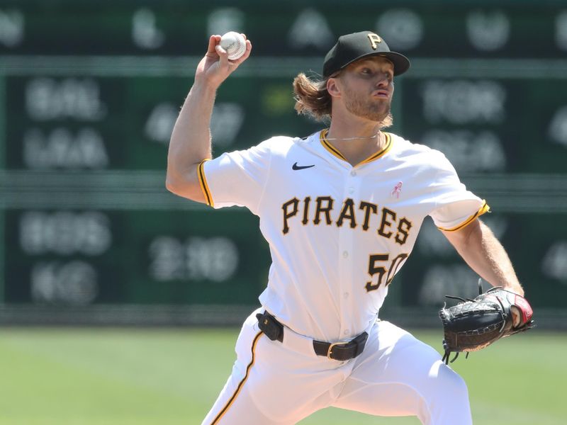 May 11, 2025; Pittsburgh, Pennsylvania, USA;  Pittsburgh Pirates starting pitcher Carmen Mlodzinski (50) delivers a pitch against the Atlanta Braves during the first inning at PNC Park. Mandatory Credit: Charles LeClaire-Imagn Images
