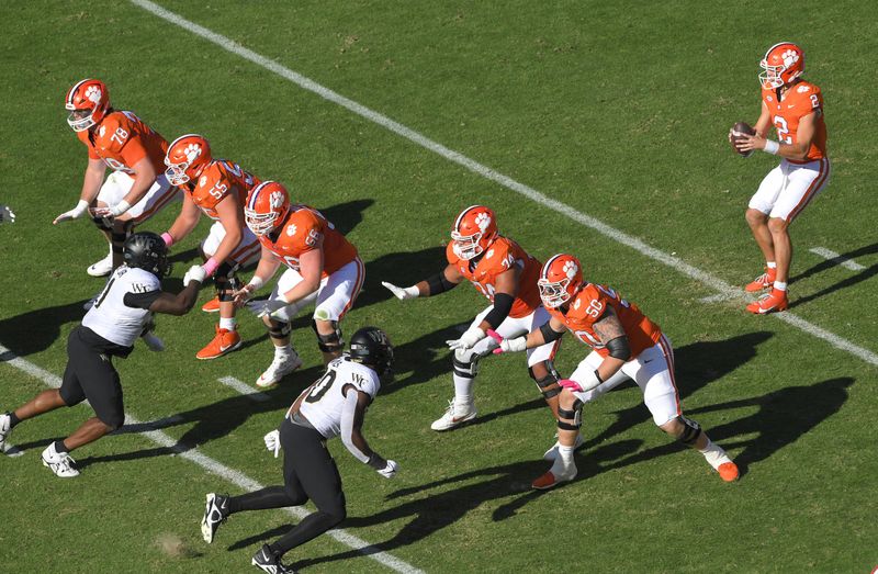 Oct 7, 2023; Clemson, South Carolina, USA; Clemson quarterback Cade Klubnik (2) takes a snap against Wake Forest during the second quarter at Memorial Stadium. Mandatory Credit: Ken Ruinard-USA TODAY Sports