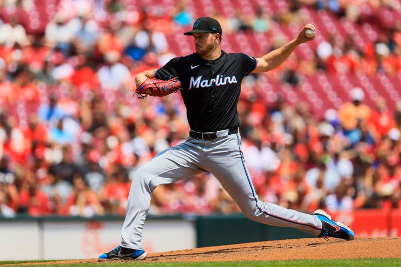 Jul 14, 2024; Cincinnati, Ohio, USA; Miami Marlins starting pitcher Trevor Rogers (28) pitches against the Cincinnati Reds in the second inning at Great American Ball Park. Mandatory Credit: Katie Stratman-USA TODAY Sports