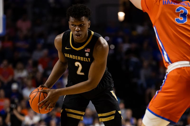 Feb 24, 2024; Gainesville, Florida, USA; Vanderbilt Commodores forward Ven-Allen Lubin (2) looks to pass while Florida Gators center Micah Handlogten (3) defends during the first half at Exactech Arena at the Stephen C. O'Connell Center. Mandatory Credit: Matt Pendleton-USA TODAY Sports