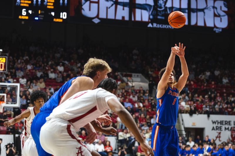 Mar 5, 2025; Tuscaloosa, Alabama, USA; Florida Gators center Rueben Chinyelu (9) shoots a free throw against the Alabama Crimson Tide during the first half at Coleman Coliseum. Mandatory Credit: Will McLelland-Imagn Images