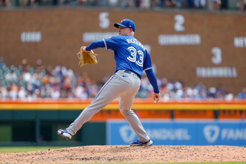 May 26, 2024; Detroit, Michigan, USA; Toronto Blue Jays pitcher Trevor Richards (33) pitches during the fourth inning  of the game against the Detroit Tigers at Comerica Park. Mandatory Credit: Brian Bradshaw Sevald-USA TODAY Sports