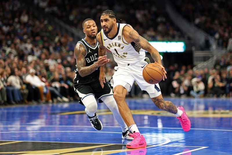 MILWAUKEE, WISCONSIN - NOVEMBER 22: Obi Toppin #1 of the Indiana Pacers drives around Damian Lillard #0 of the Milwaukee Bucks during the first half of a game in the NBA Emirates Cup at Fiserv Forum on November 22, 2024 in Milwaukee, Wisconsin. NOTE TO USER: User expressly acknowledges and agrees that, by downloading and or using this photograph, User is consenting to the terms and conditions of the Getty Images License Agreement. (Photo by Stacy Revere/Getty Images)