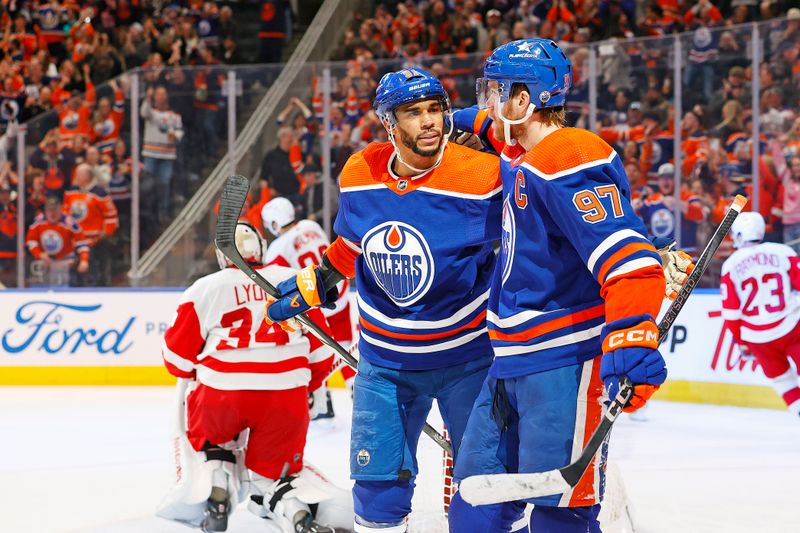 Feb 13, 2024; Edmonton, Alberta, CAN; The Edmonton Oilers celebrate a goal scored by forward Evander Kane (91) during the third period against the Detroit Red Wings at Rogers Place. Mandatory Credit: Perry Nelson-USA TODAY Sports