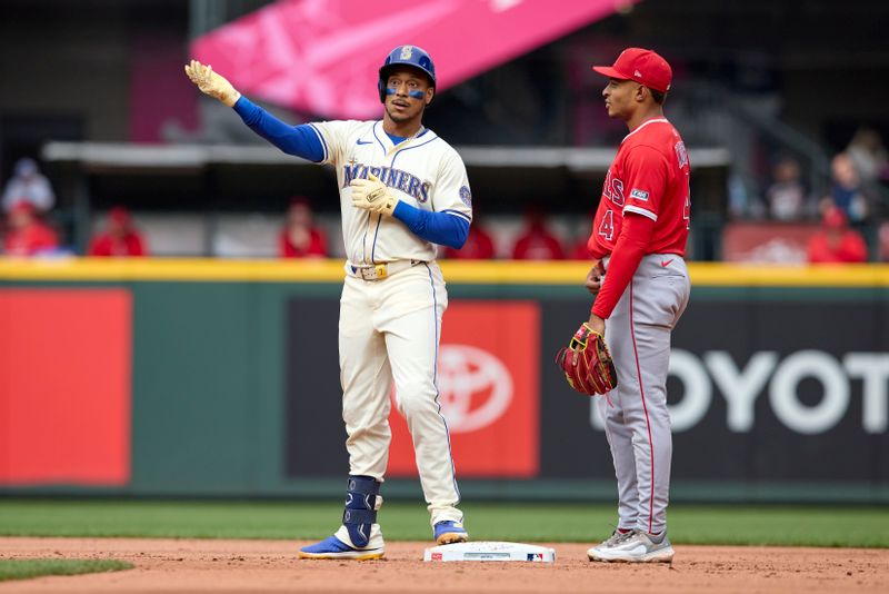 Sep 14, 2025; Seattle, Washington, USA; Seattle Mariners designated hitter Jorge Polanco (7) reacts from second on a double against the Los Angeles Angels during the fourth inning at T-Mobile Park. Mandatory Credit: John Froschauer-Imagn Images