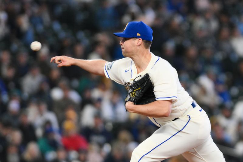 Apr 16, 2023; Seattle, Washington, USA; Seattle Mariners relief pitcher Justin Topa (48) pitches to the Colorado Rockies during the eighth inning at T-Mobile Park. Mandatory Credit: Steven Bisig-USA TODAY Sports