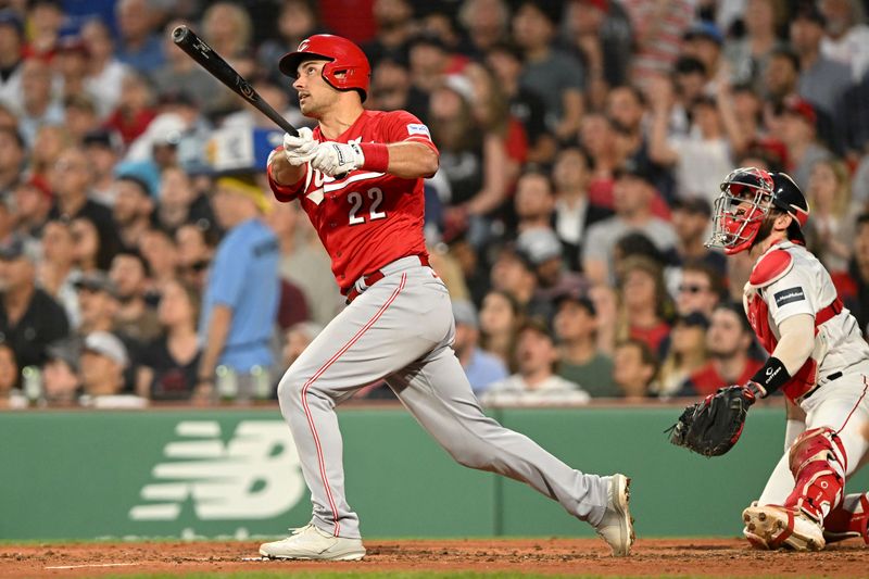 May 31, 2023; Boston, Massachusetts, USA; Cincinnati Reds catcher Luke Maile (22) watches the ball after hitting a RBI double against the Boston Red Sox during the fifth inning at Fenway Park. Mandatory Credit: Brian Fluharty-USA TODAY Sports
