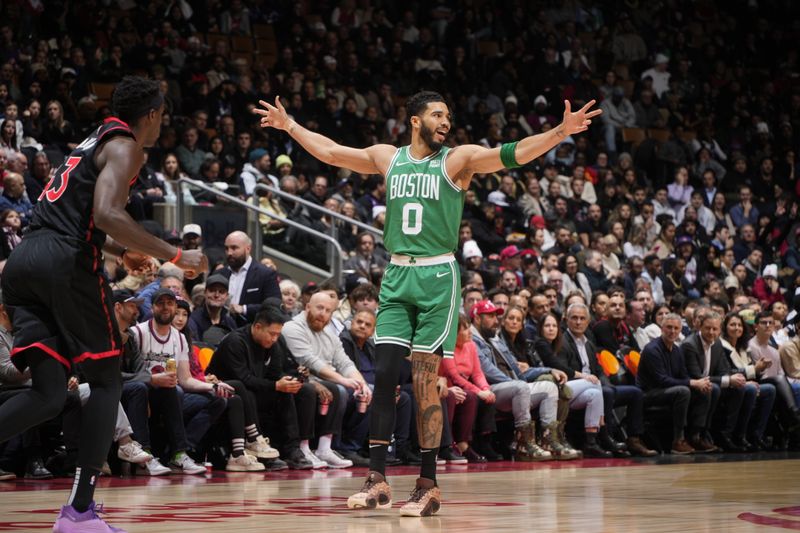 TORONTO, CANADA - JANUARY 15: Jayson Tatum #0 of the Boston Celtics celebrates during the game against the Toronto Raptors  on January 15, 2024 at the Scotiabank Arena in Toronto, Ontario, Canada.  NOTE TO USER: User expressly acknowledges and agrees that, by downloading and or using this Photograph, user is consenting to the terms and conditions of the Getty Images License Agreement.  Mandatory Copyright Notice: Copyright 2024 NBAE (Photo by Mark Blinch/NBAE via Getty Images)