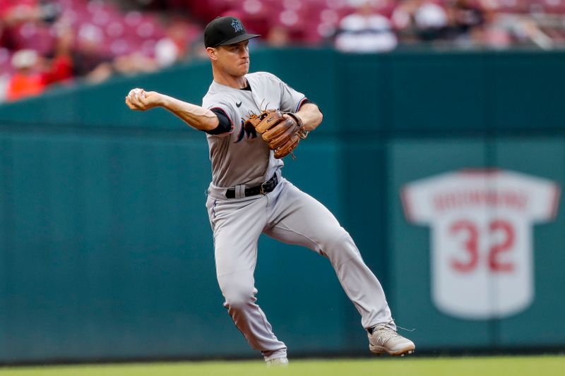 Aug 8, 2023; Cincinnati, Ohio, USA; Miami Marlins shortstop Joey Wendle (18) throws to second to get Cincinnati Reds left fielder Spencer Steer (not pictured) out in the second inning at Great American Ball Park. Mandatory Credit: Katie Stratman-USA TODAY Sports