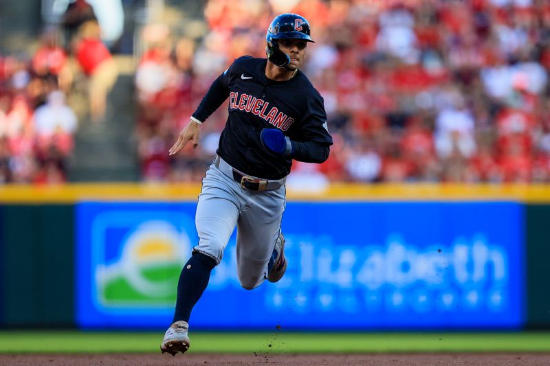 Jun 12, 2024; Cincinnati, Ohio, USA; Cleveland Guardians second baseman Andres Gimenez (0) runs to third on a single hit by designated hitter Gabriel Arias (not pictured) in the second inning against the Cincinnati Reds at Great American Ball Park. Mandatory Credit: Katie Stratman-USA TODAY Sports